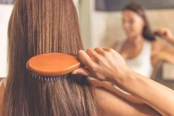 Woman brushing her hair