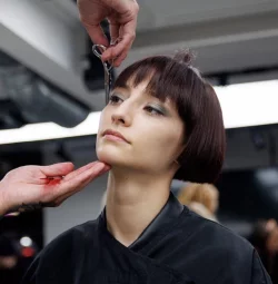 Hairdresser cutting a bob